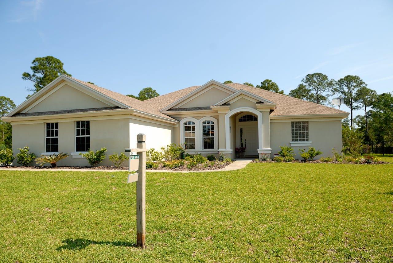 Beautiful home exterior with landscaped lawn
